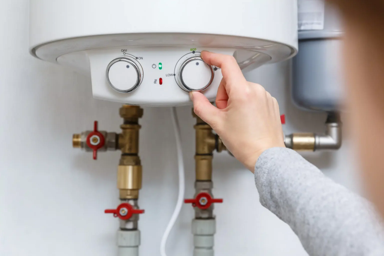 Technician adjusting a water heater in Laguna Beach