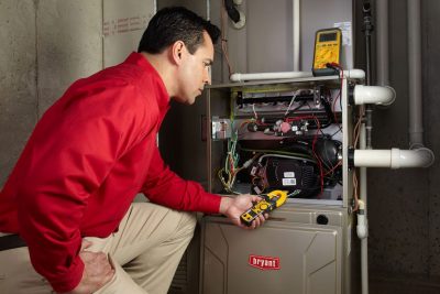 Furnace Repair Laguna Beach Heating technician diagnosing a furnace repair in Laguna Beach